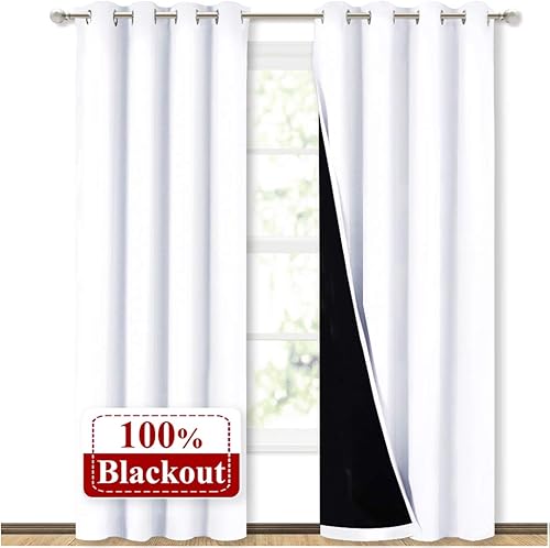 NICETOWN 100% blackout curtain panels in white for bedroom sleep