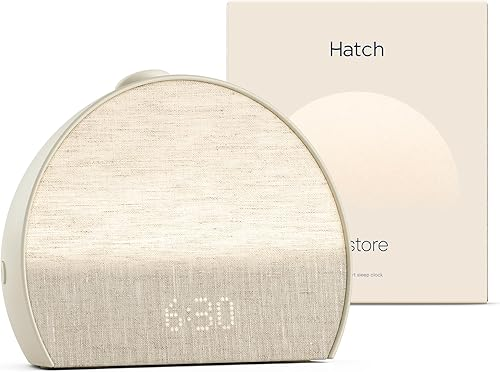 Hatch Restore 3 sunrise alarm clock on bedroom nightstand