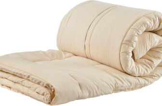 Sleep and Beyond myMerino organic wool mattress topper on bed