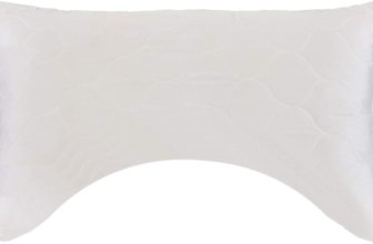 Sleep and Beyond myWoolly pillow white cotton cover on bed