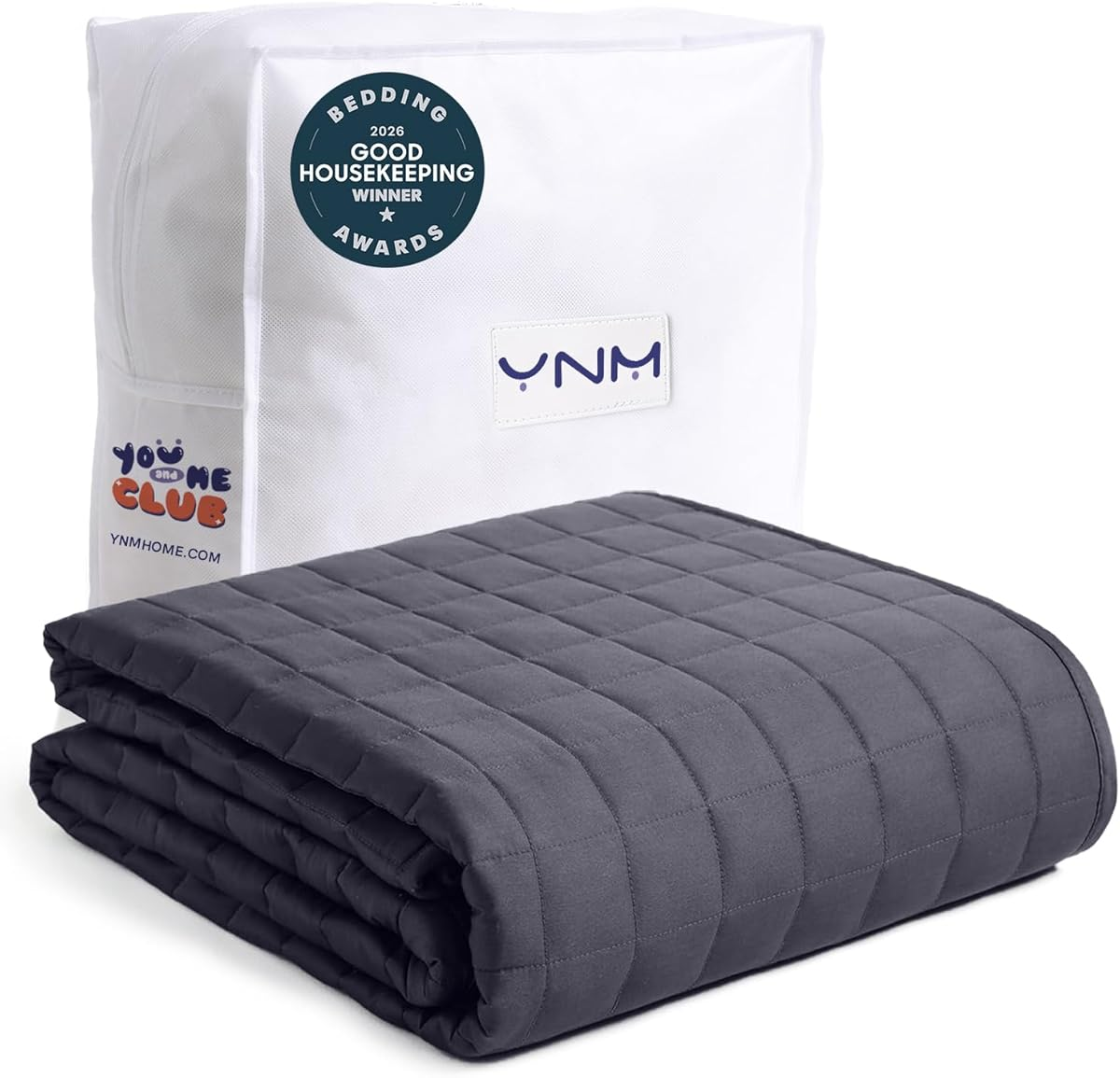 YnM weighted blanket with cooling glass beads on bed