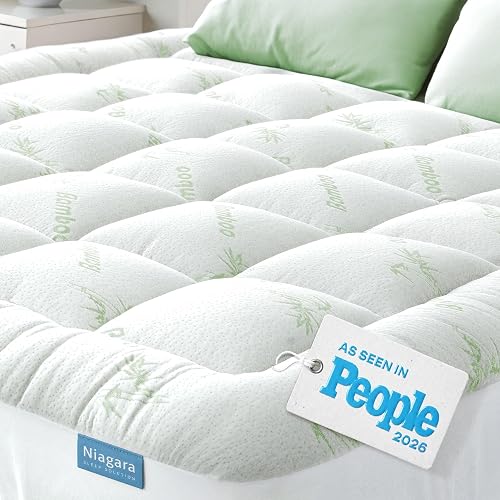 Niagara Sleep Solution pillow top mattress topper on a queen bed