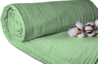 Sleep and Beyond Organic Cotton Muslin Blanket in sage green