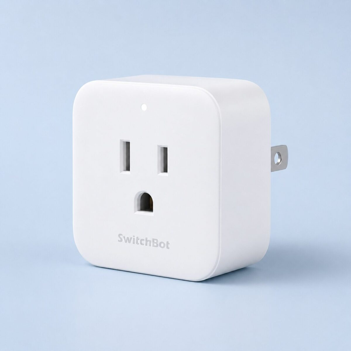 SwitchBot Plug Mini smart plug in white on light blue background