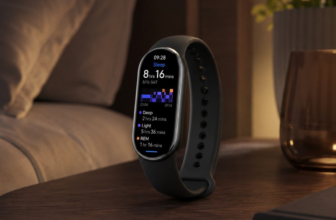 Xiaomi Mi Smart Band 10 fitness tracker on wooden nightstand displaying sleep stages