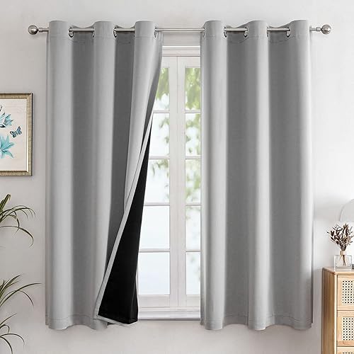 ChrisDowa blackout curtains hanging in a bedroom