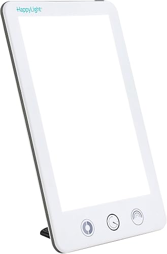 Verilux HappyLight Touch Plus light therapy lamp on a desk