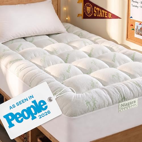 Niagara twin XL quilted mattress topper on bed