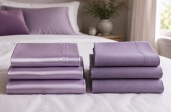 Two stacks of folded sheets on a bed, one silky bamboo and one crisp cotton